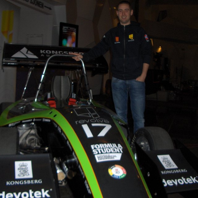 The NTNU racing car with one of the Marketing Managers.