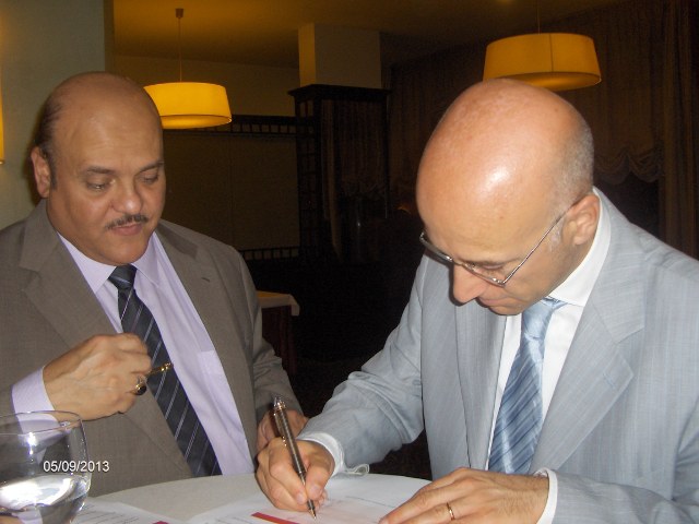 Dr. Emanuele Carpanzano signing the declaration of Lugano.